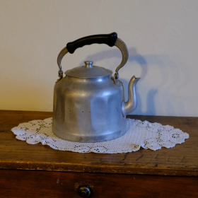 Antique aluminum kettle with bakelite handle – vintage kitchen collectible