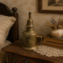 Petite lampe à huile ancienne en laiton