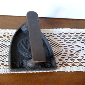 Antique cast iron charcoal iron – vintage laundry tool collectible